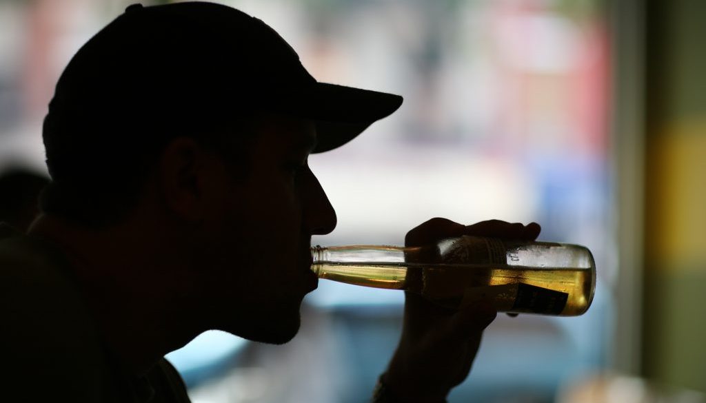 Silhouette,Of,A,Man,Drinking,Beer.,Close-up.